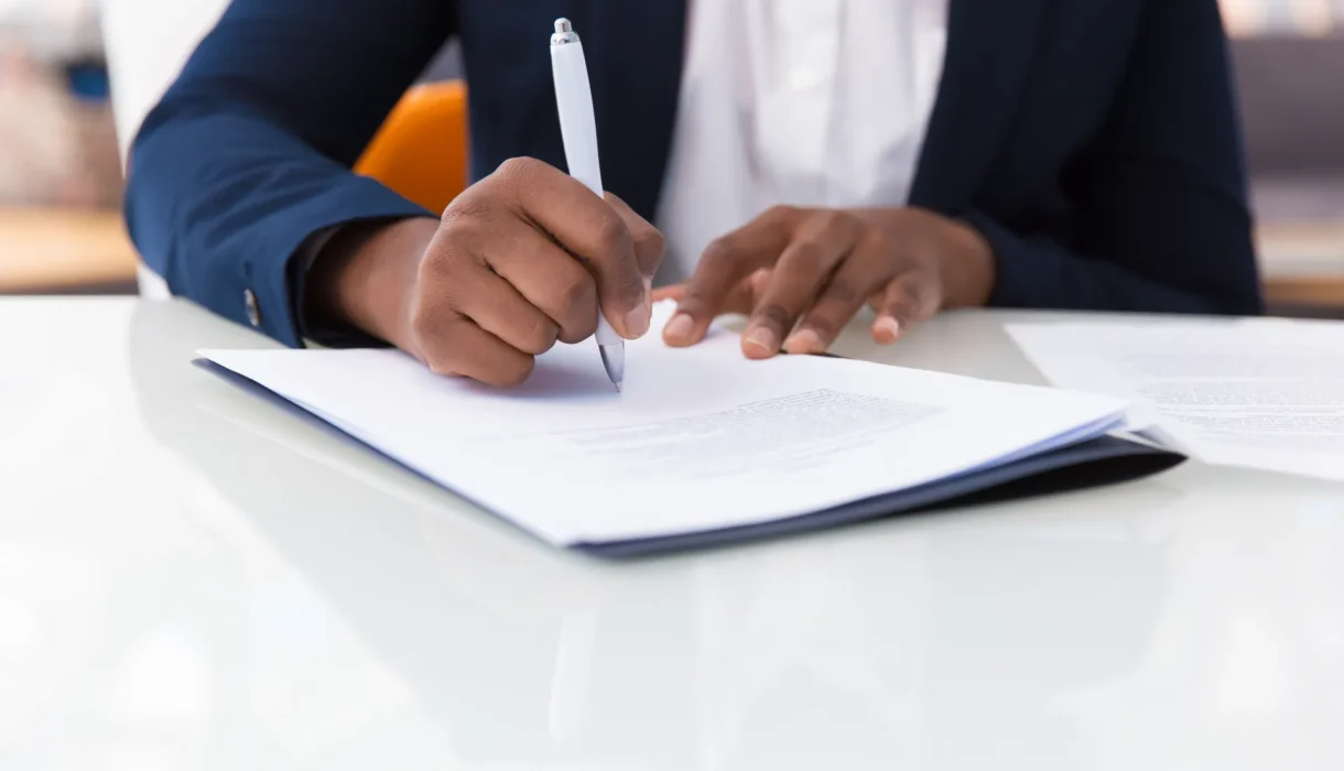Businesswoman signing a contract
