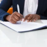 Businesswoman signing a contract