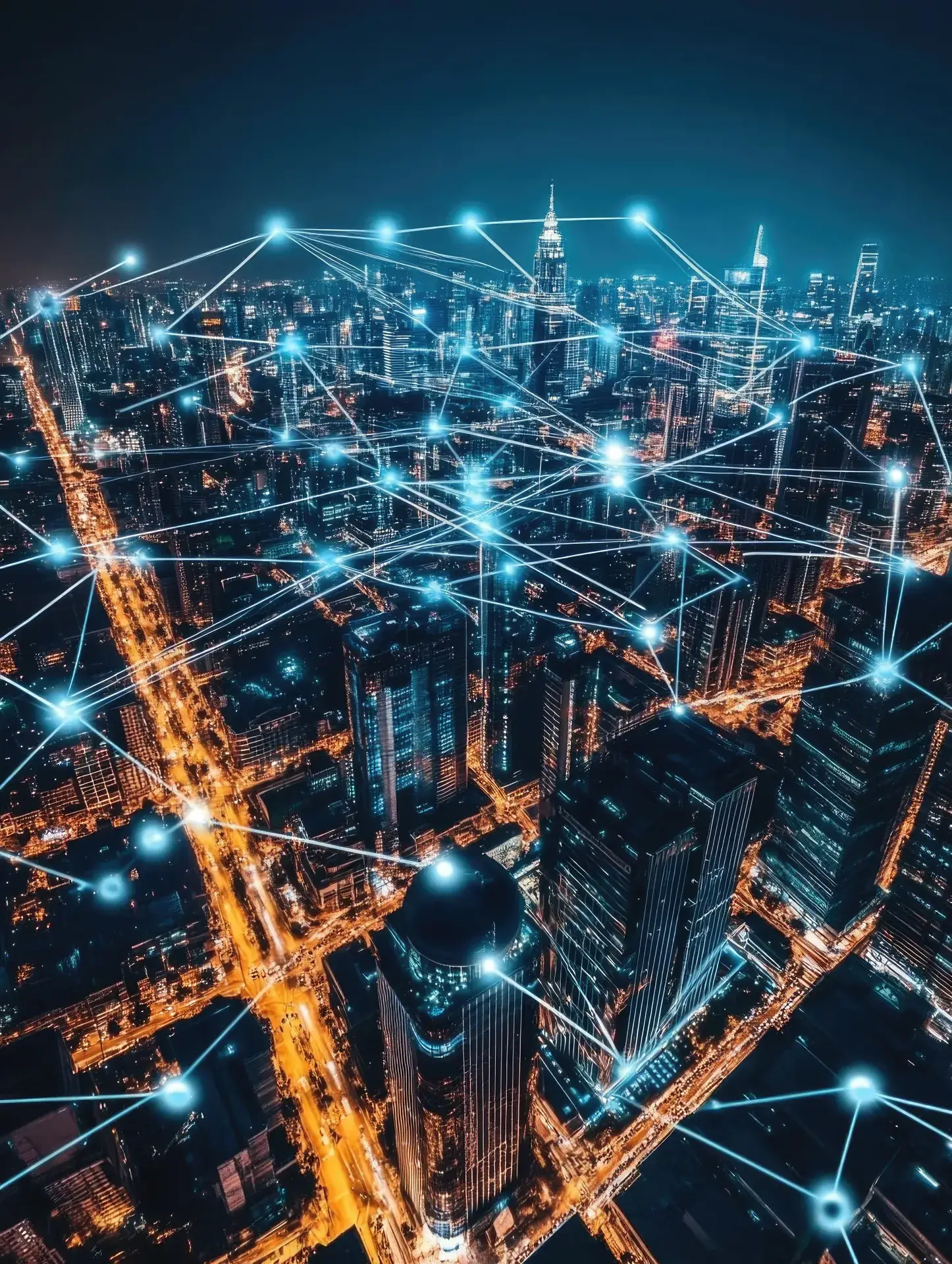 High-rise residential buildings with telecom network connections at night